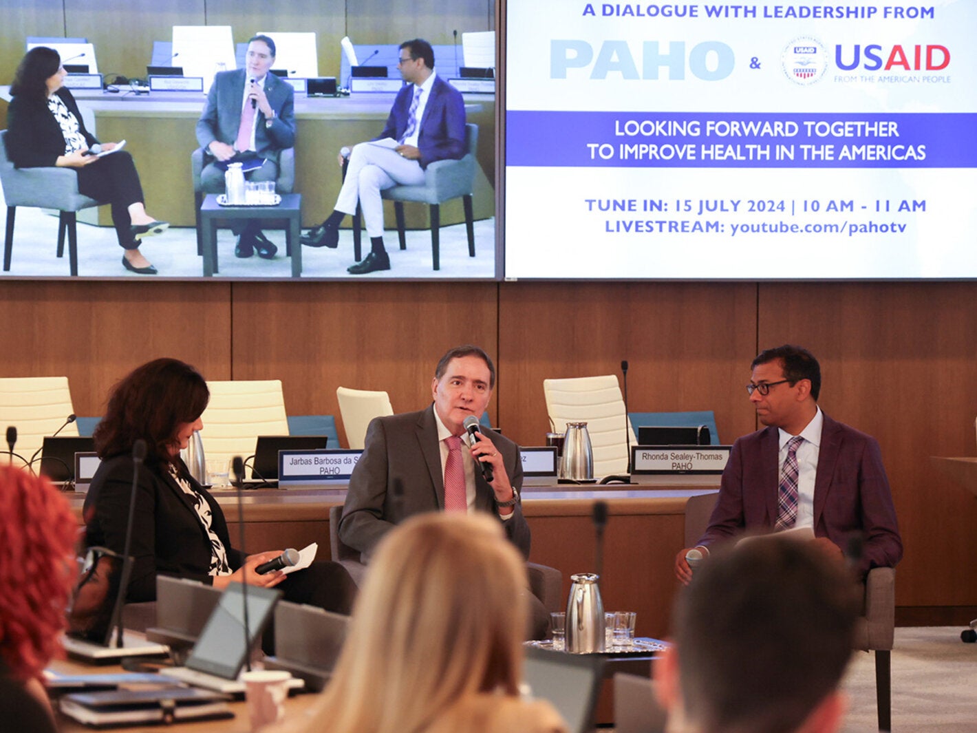 paho director speaking at the meeting