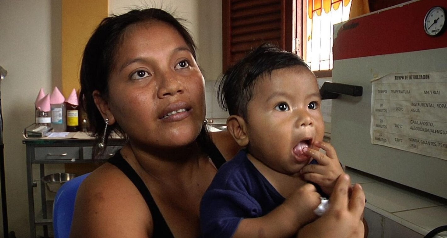 woman with toddler on her lap