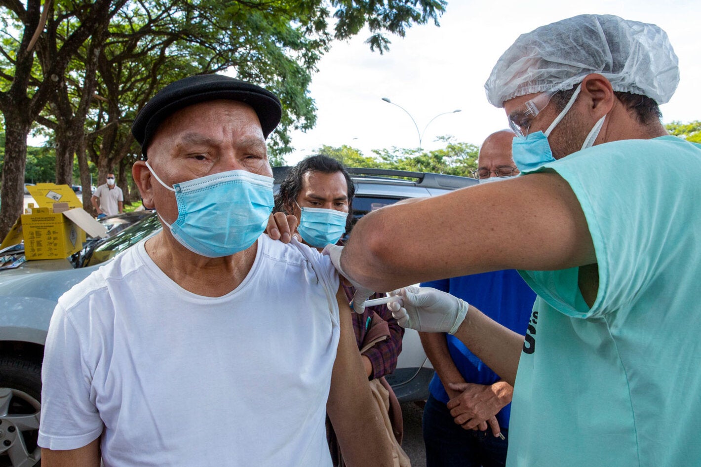 Older adult receives COVID-19 vaccine