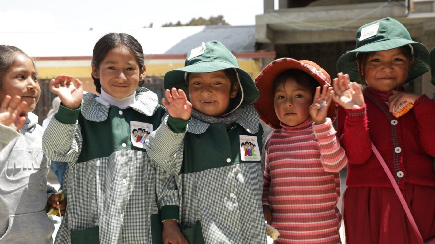 Children of the Americas posing in front of the camara