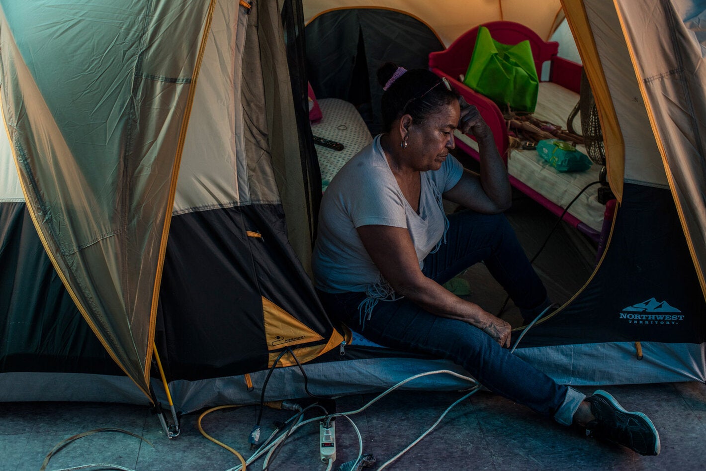 woman in tent after disaster