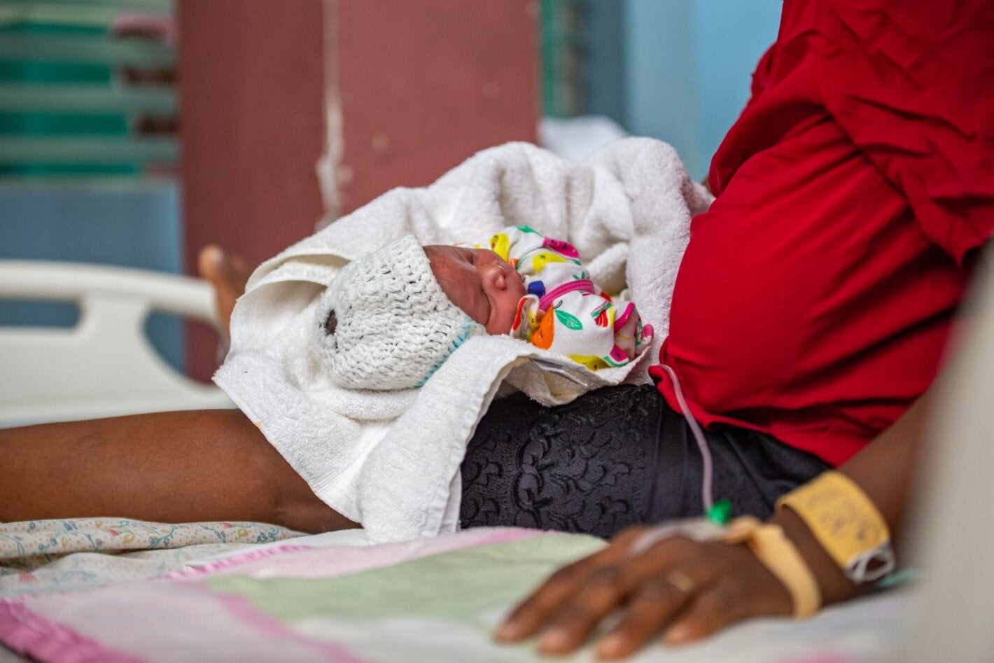 Newborn with his mother