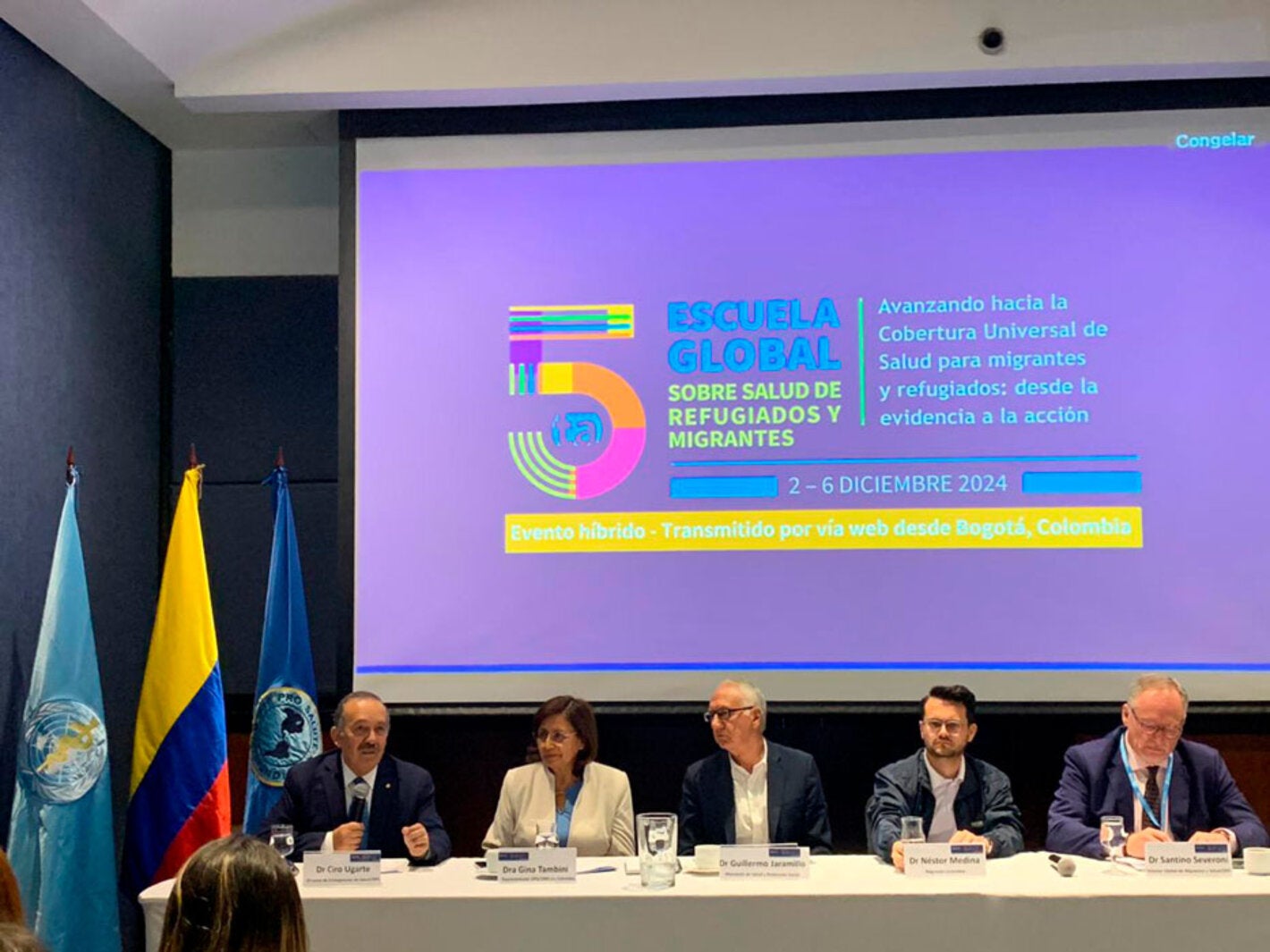 Mesa principal quinta escuela global de migrantes y refugiados presedida por el ministro y altas auoriodades de OPS y oms 