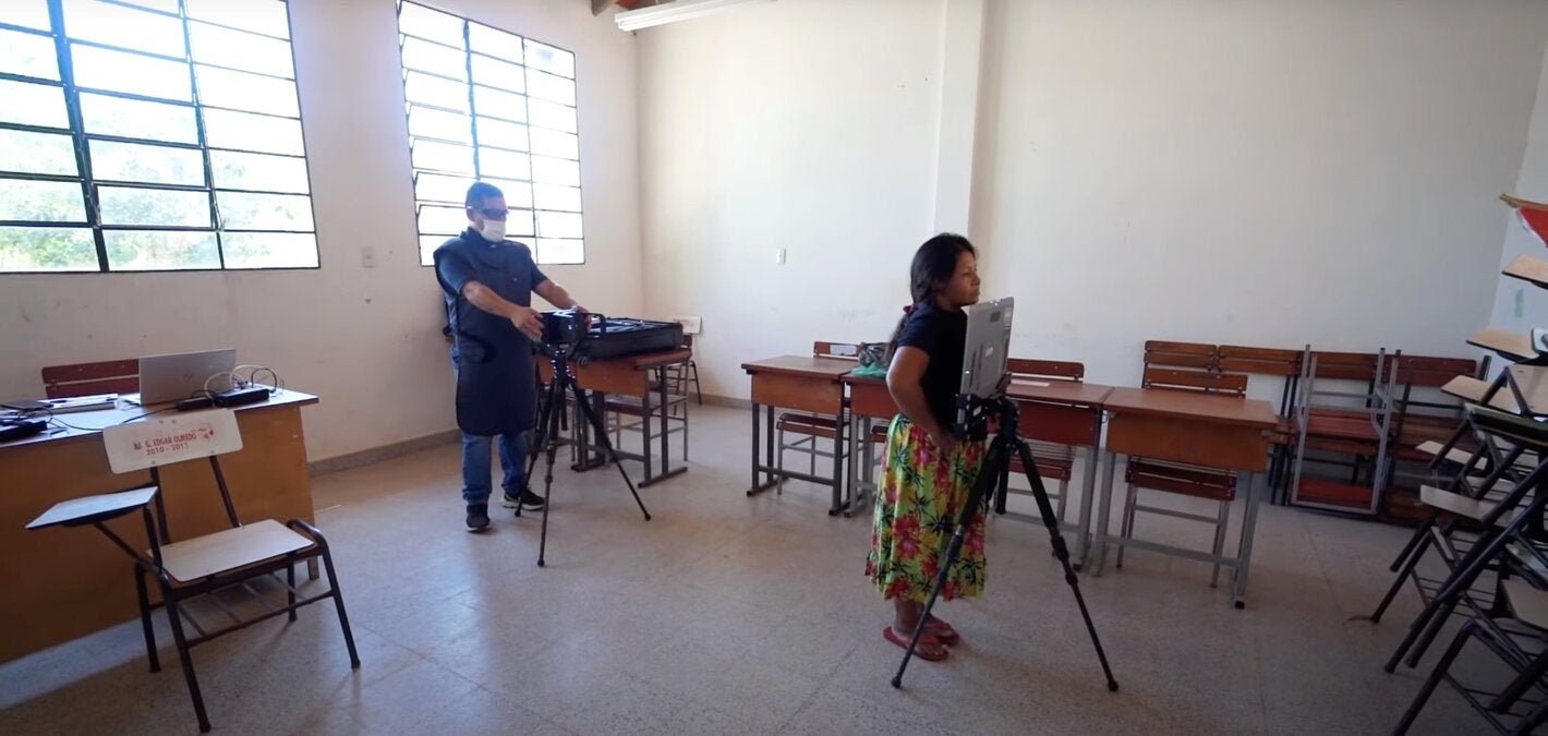 woman is examined for TB