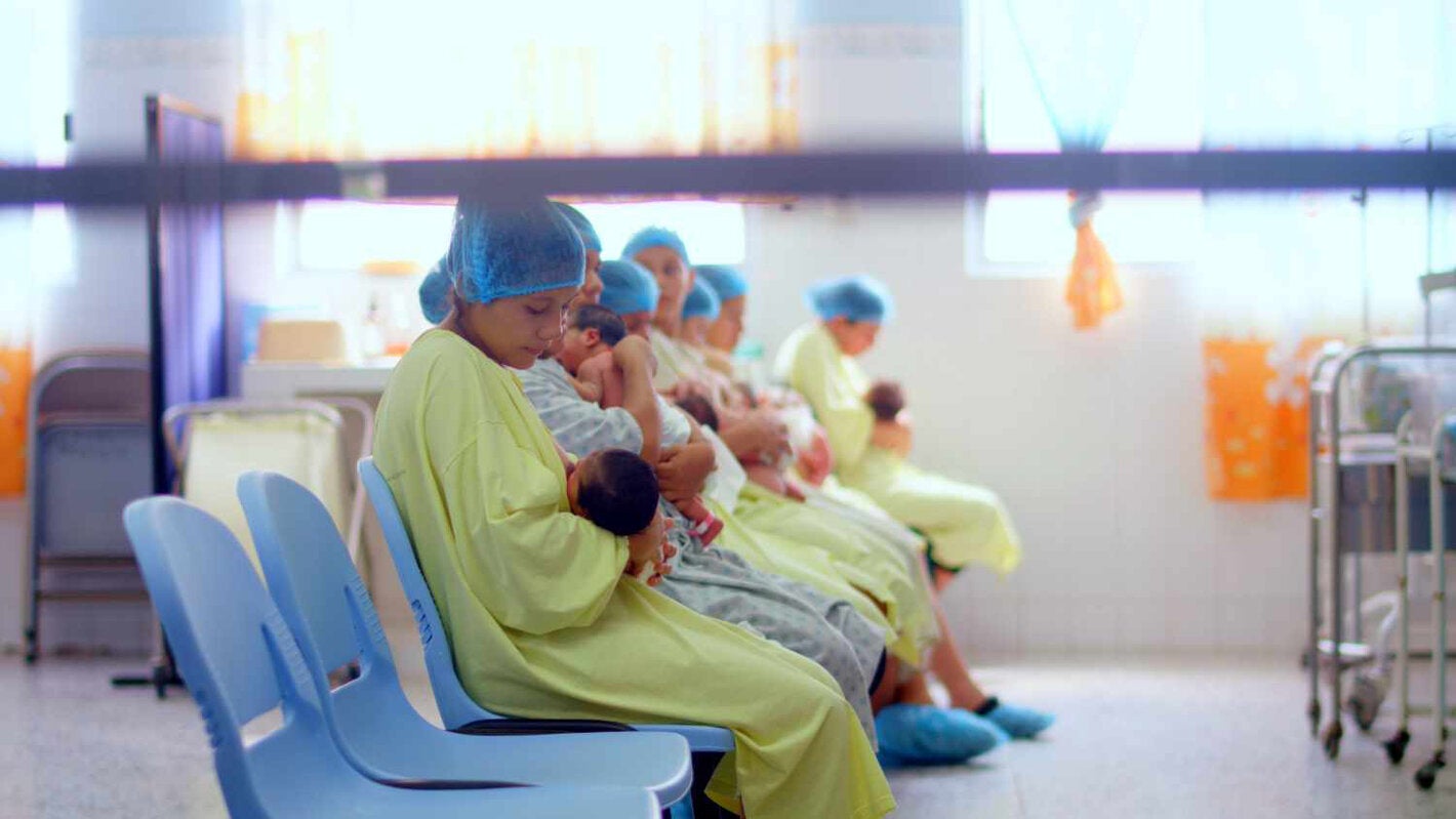 mothers breastfeeding newborns