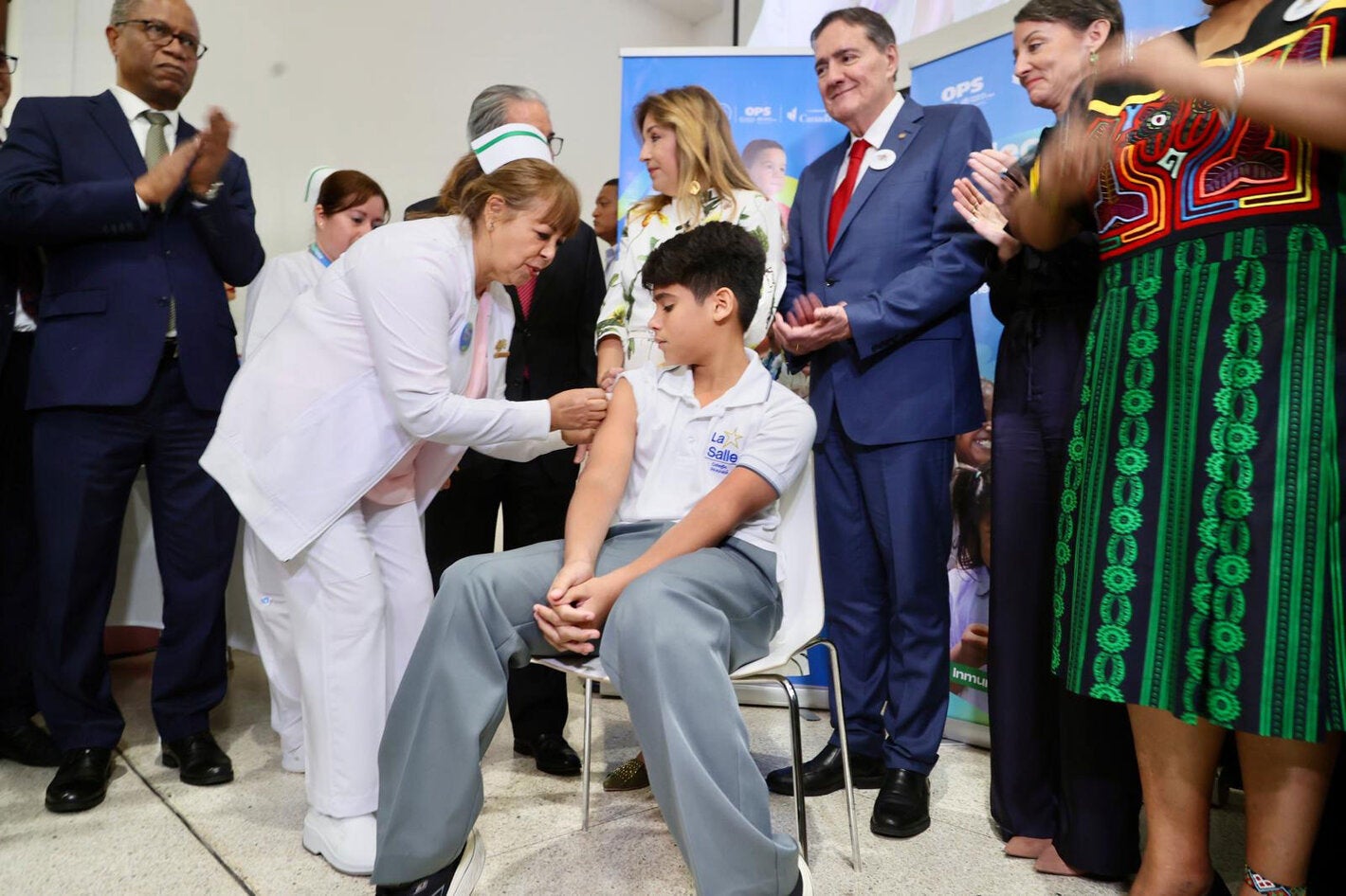 Boy receives vaccination during the launching of Vaccination Week in the Americas