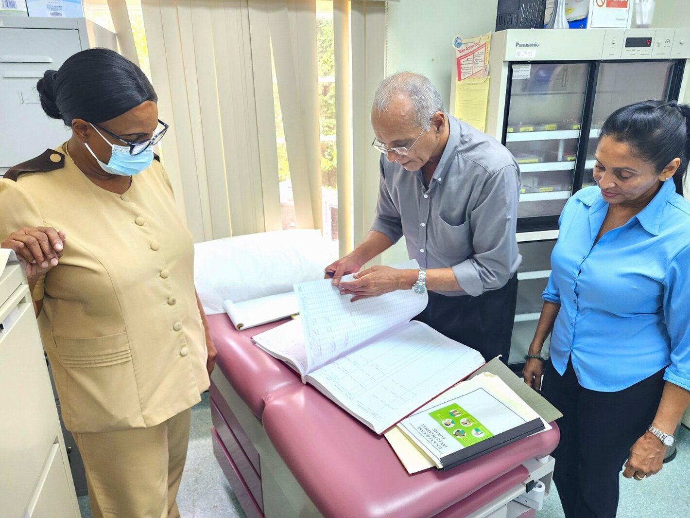 AssessAssessment team reviews Immunization documentation at a Health Facility