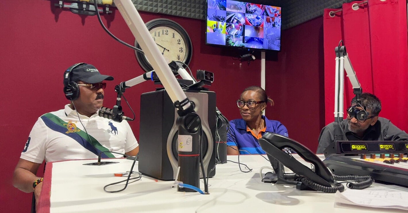 PAHO team at radio show with Prime Minister of Antigua and Barbuda