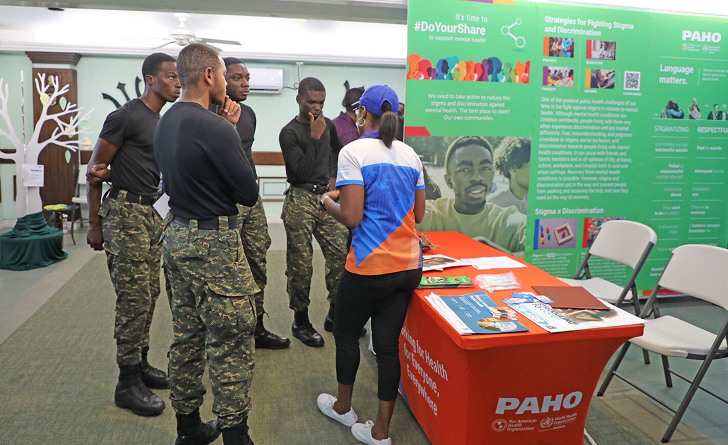 PAHO Advisor interacting with members of the Barbados Defence Force