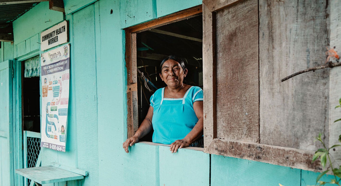 Woman surrounded by a window frame