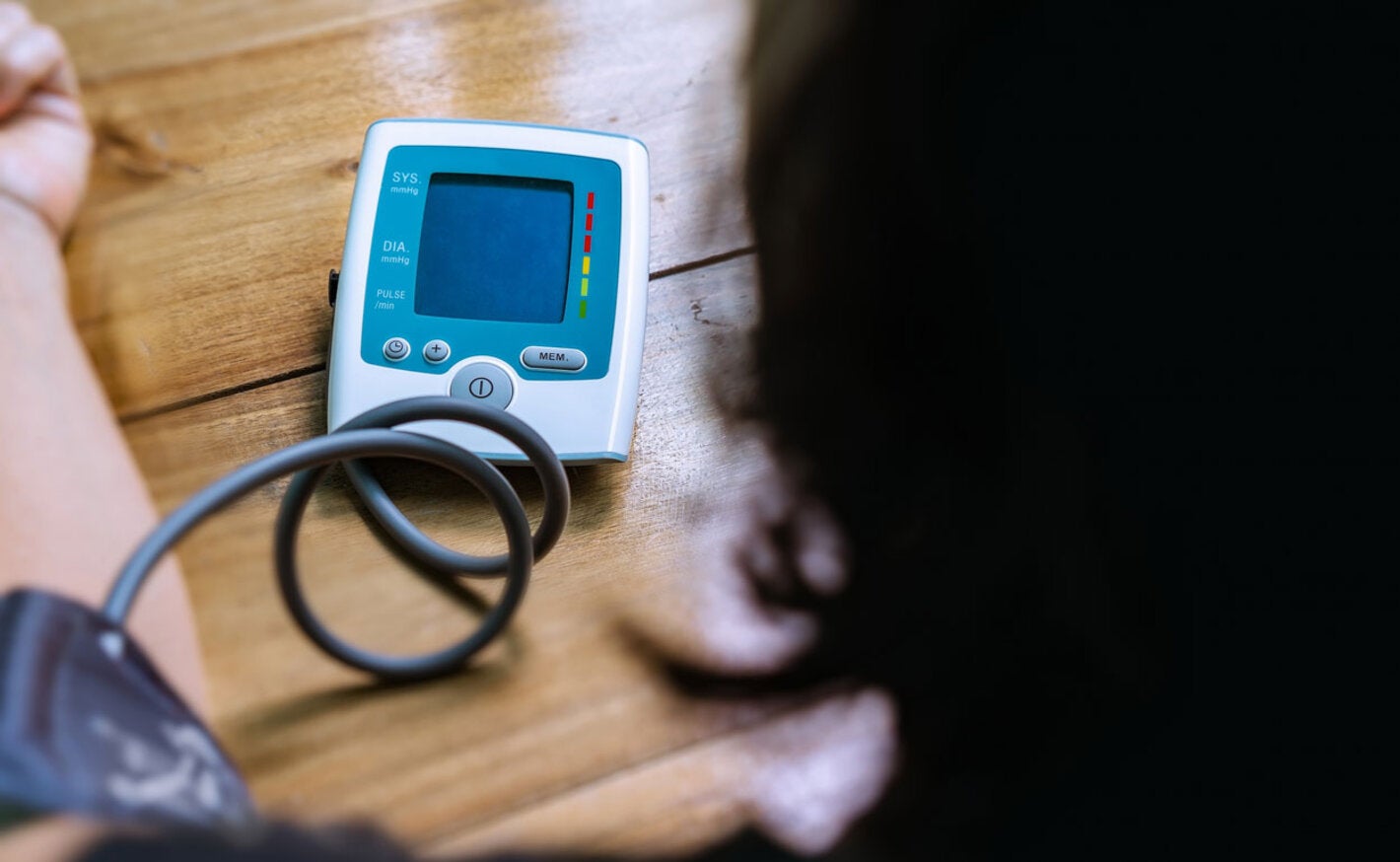 Woman checking her blood pressure