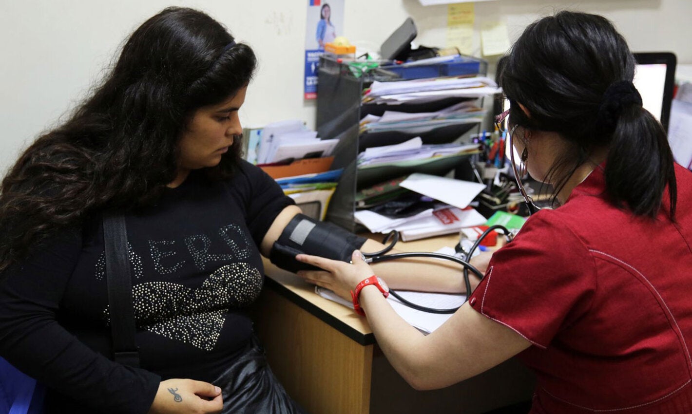 Mulher grávida em consulta médica