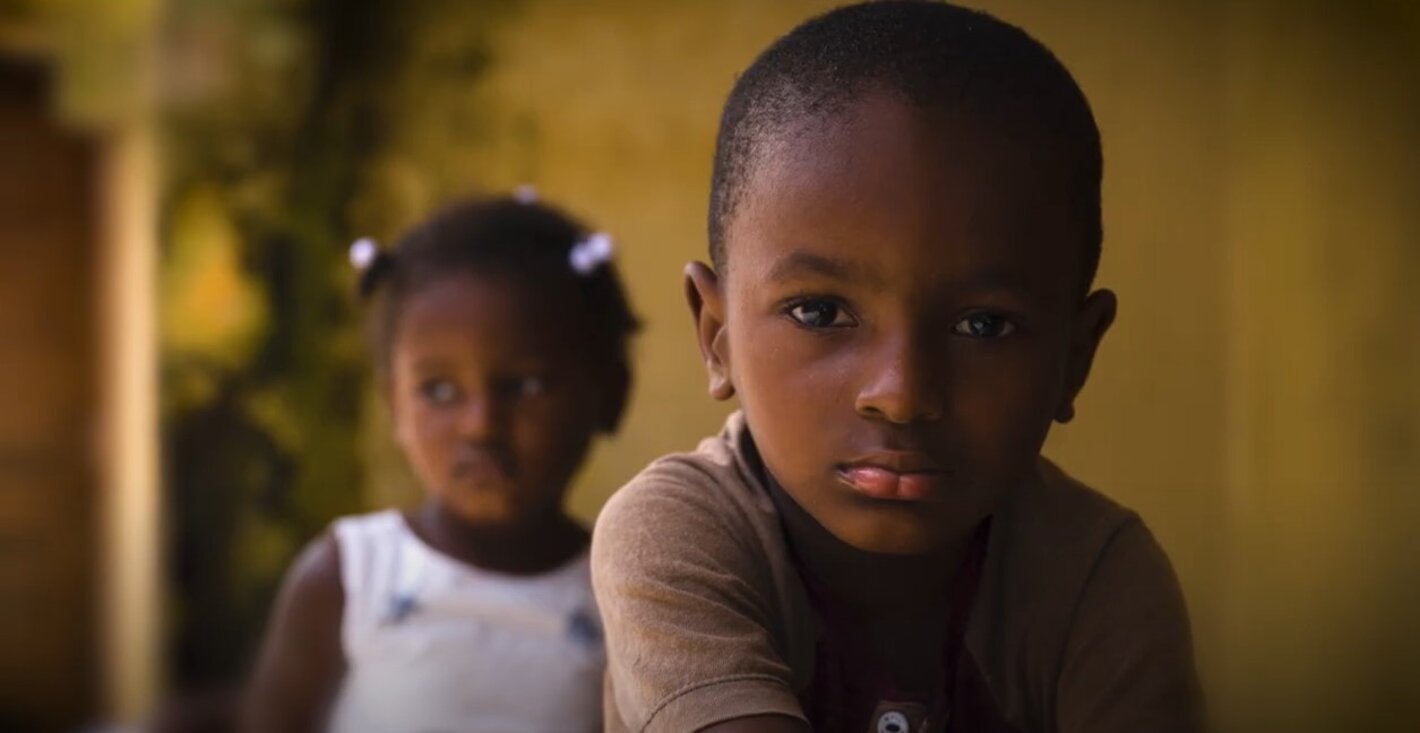 Two children looking at the camera.