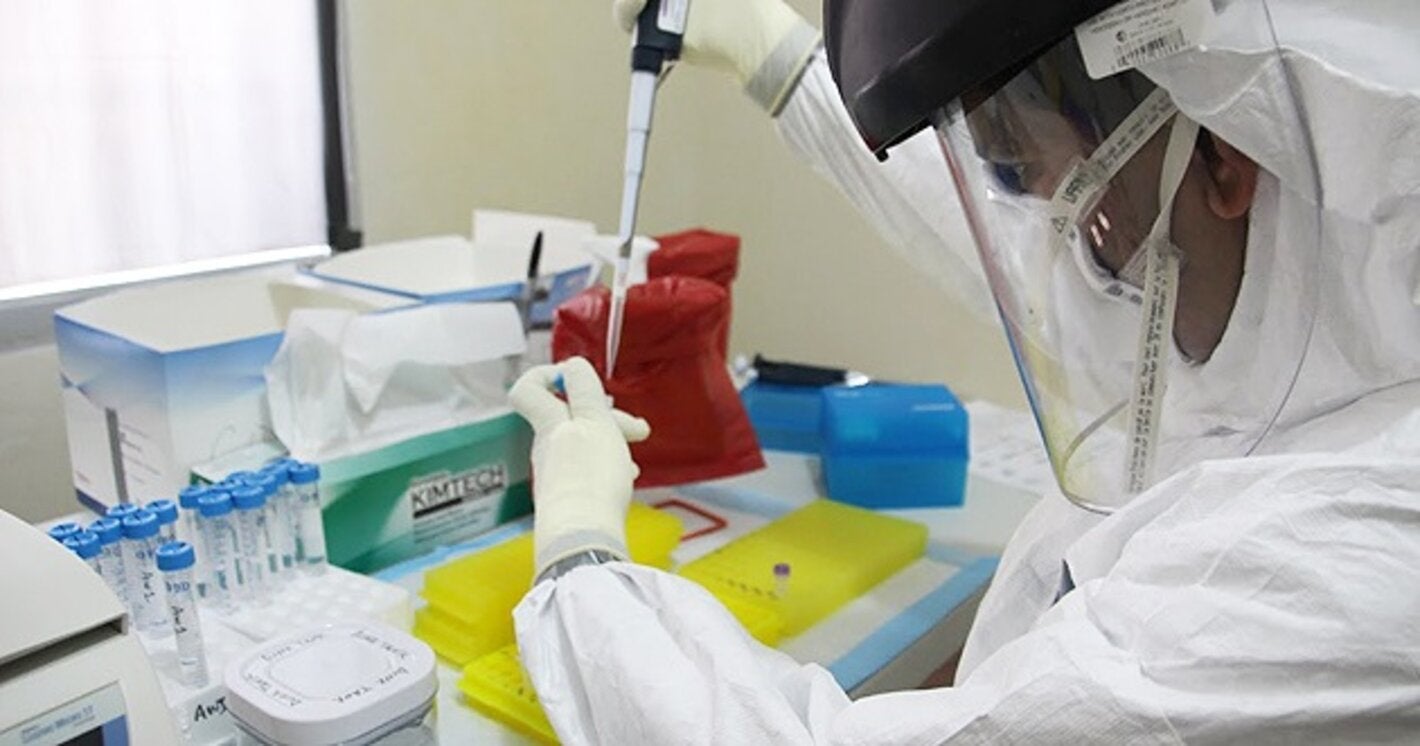 Man in lab with blood sample