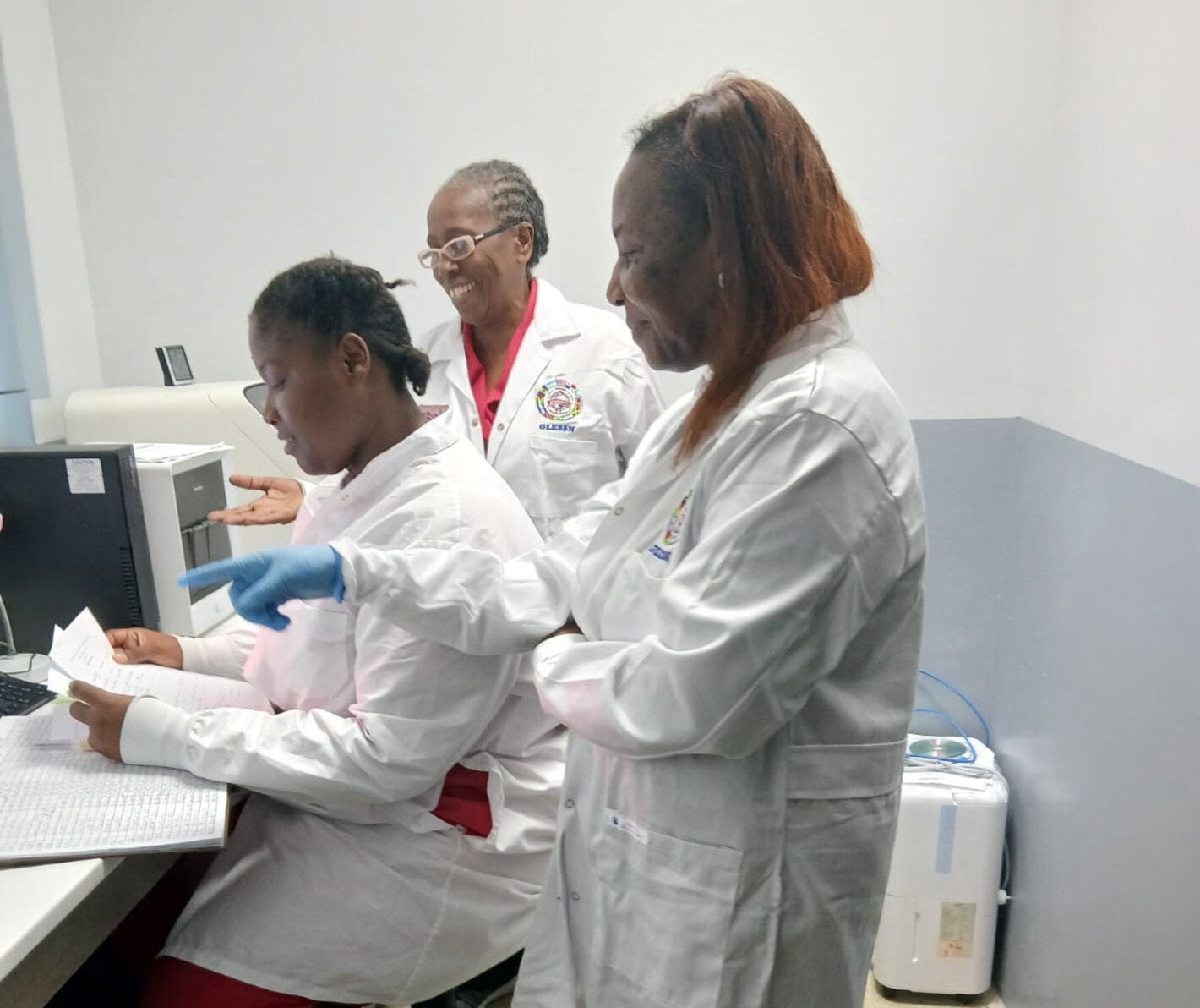 Assessment team in Grenada's laboratory