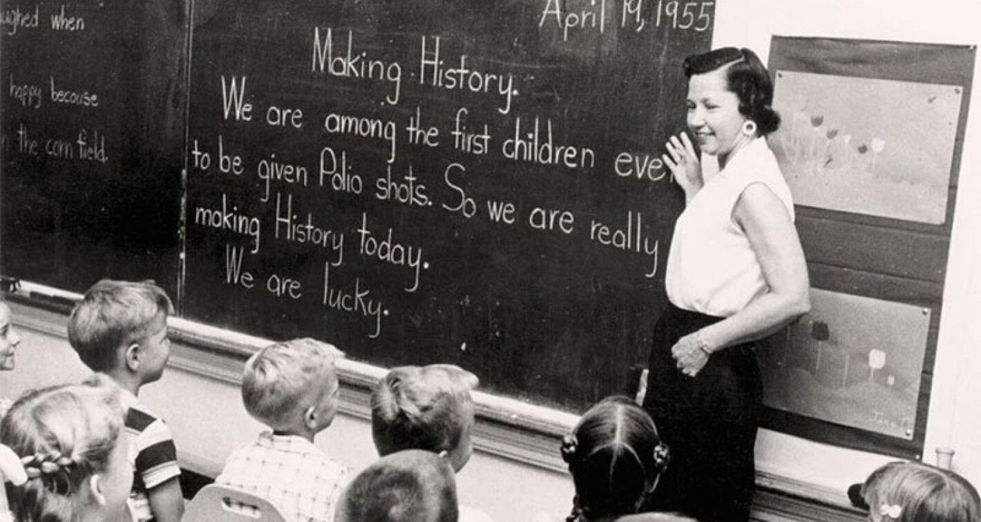 black and white historical photo children 1950 learn about polio vaccine