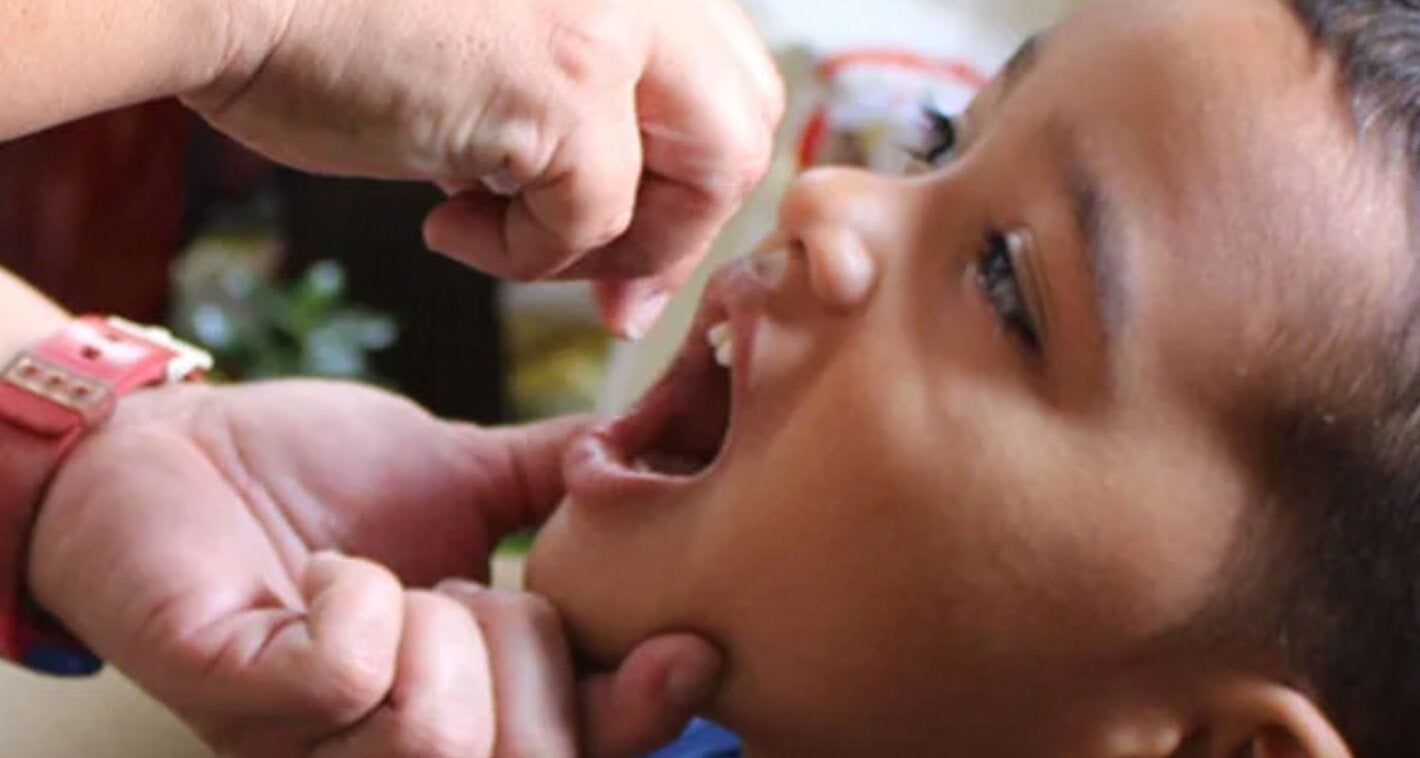child getting the polio vaccine