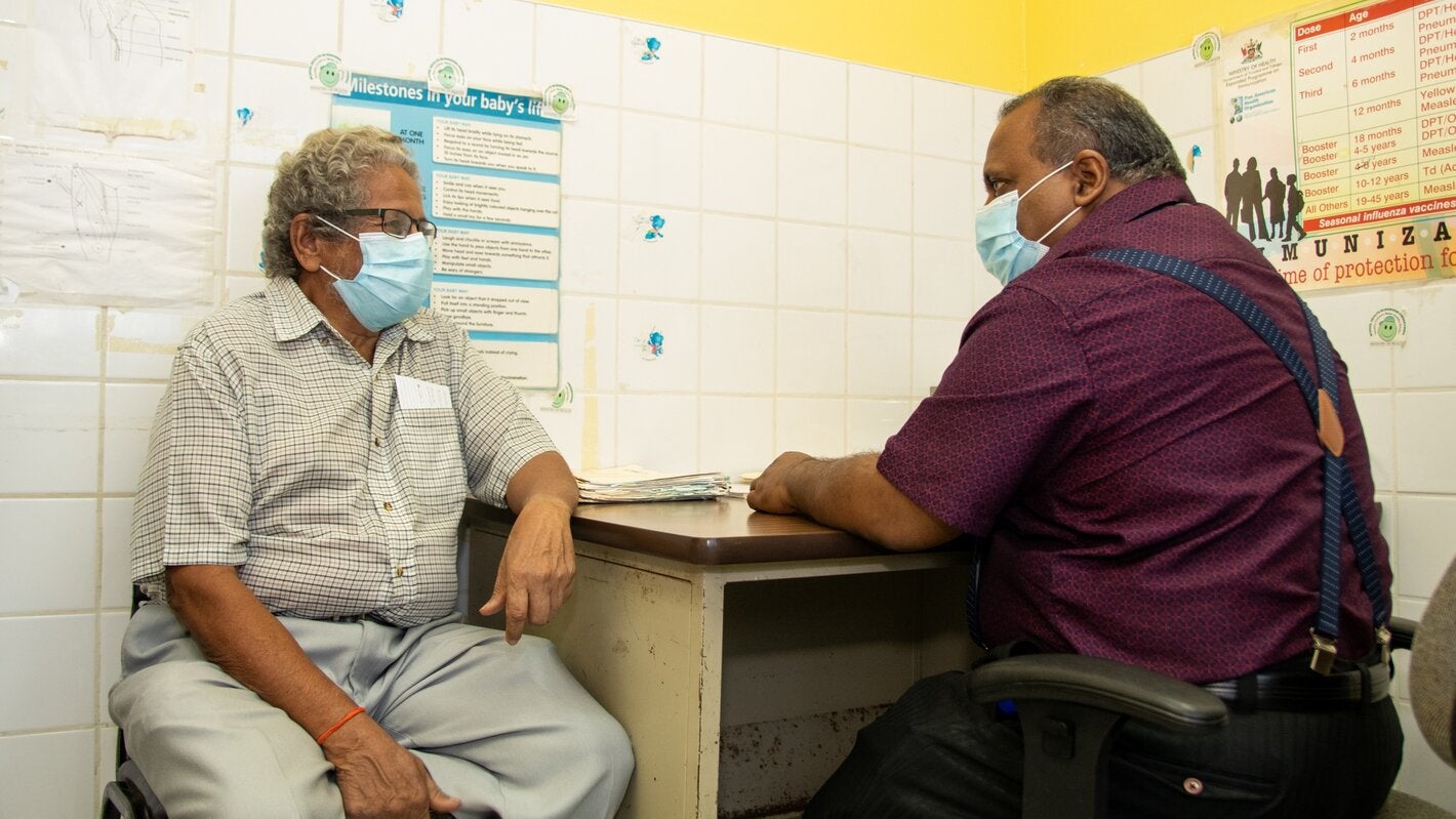Patient Mr. Krishna Maharaj with his physician Dr. Michael Jaggernauth at Freeport Health Centre