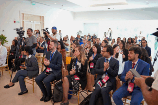 ""participante de la 12 asamblea ordinaria de la rilaa asistiendo a la abertura