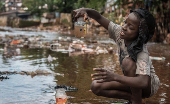 Kid playing with water