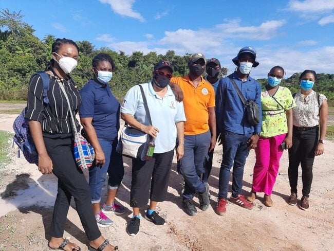 Photo of people sitting on a classroom taking a training
