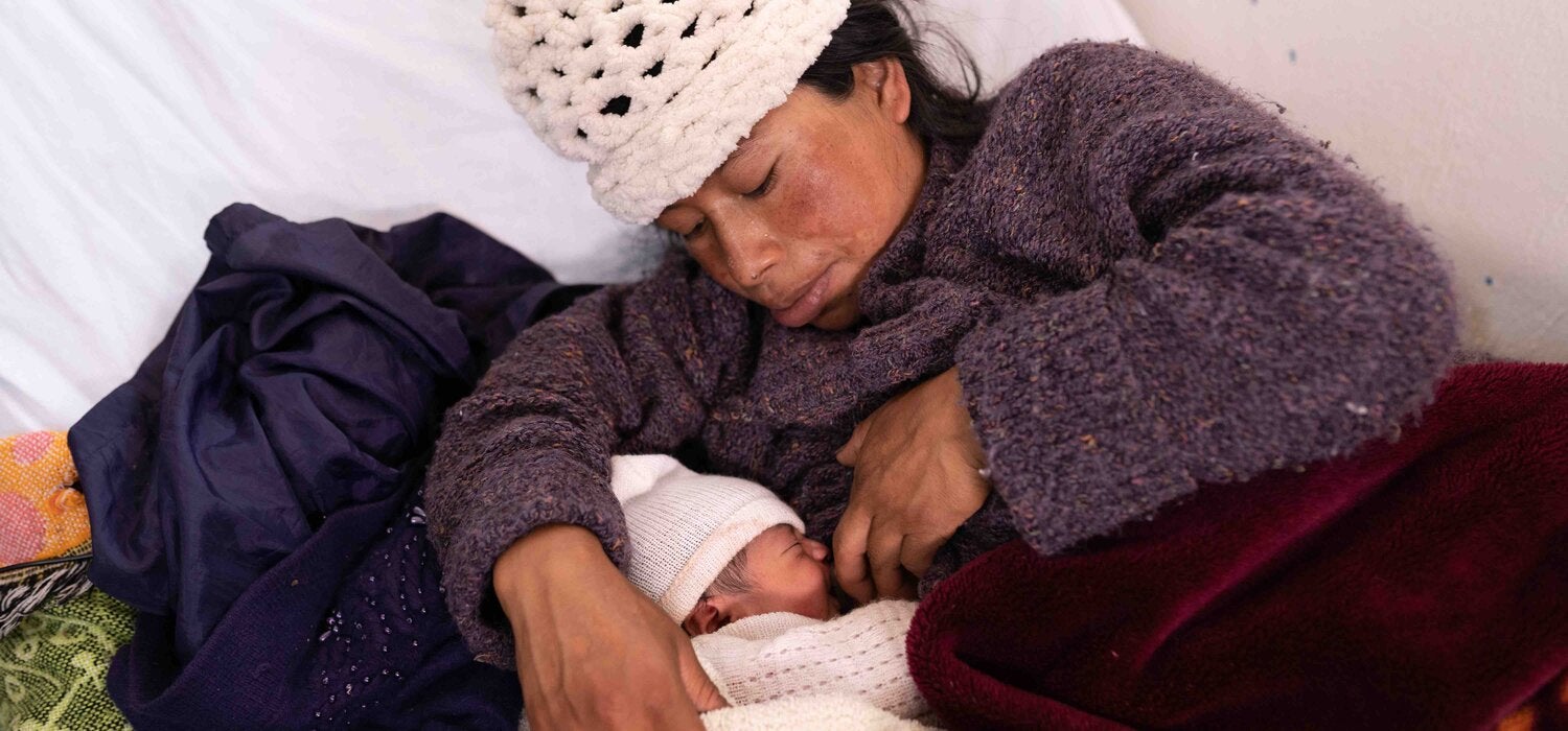 Guatemalan mother breastfeeds child