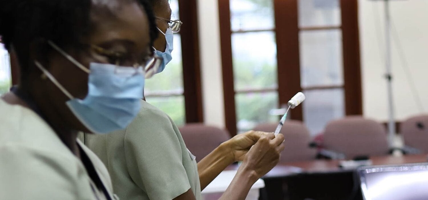 Nurse preparing influenza vaccine