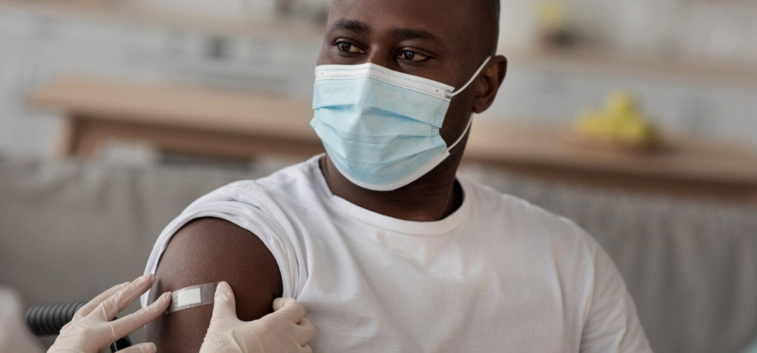 Wheel chair bound person receives vaccine