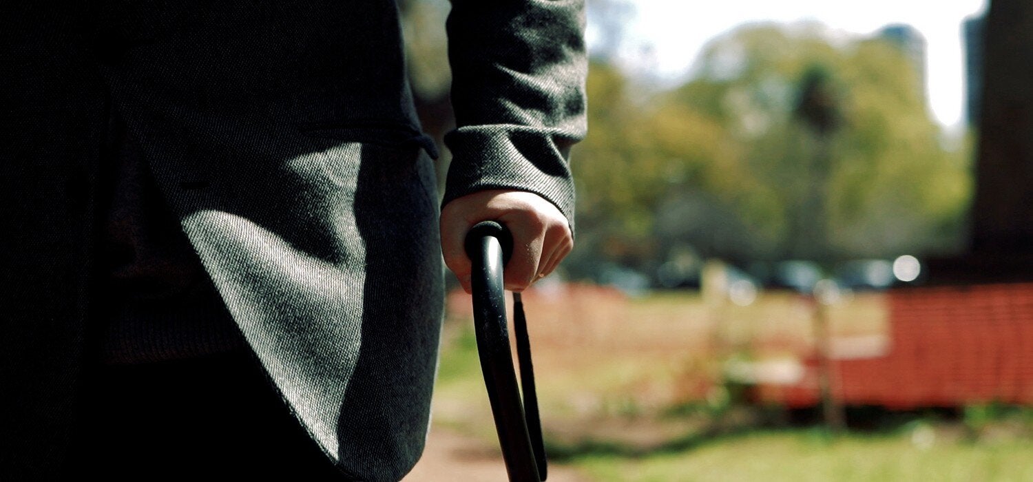 Hombre con bastón