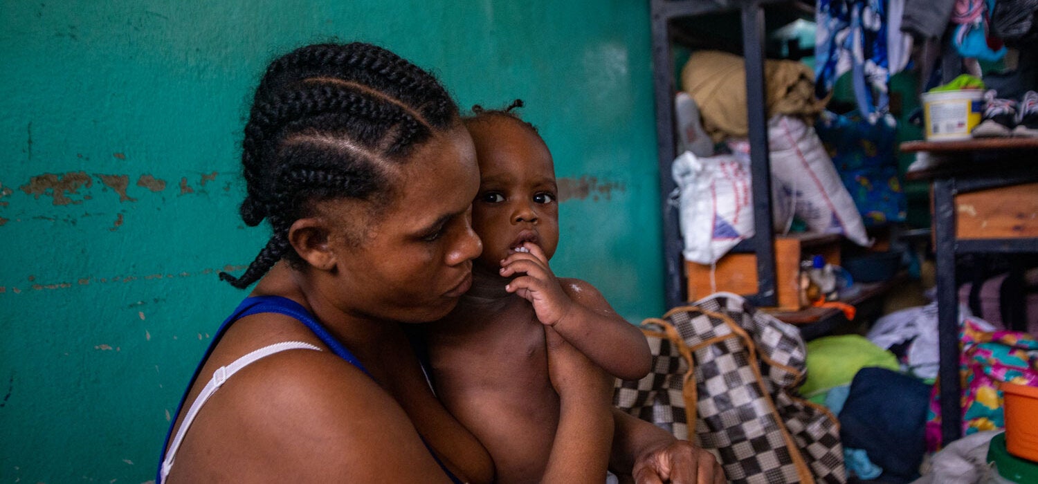 Displaced mother and child in shelter