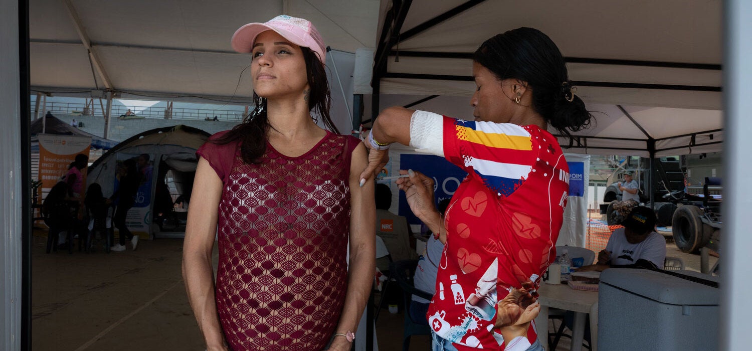 Pregnant woman receives vaccine in Venezuela