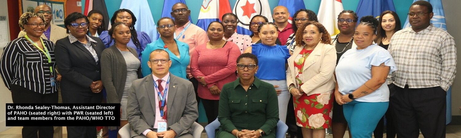 Dr. Rhonda Sealey-Thomas, Assistant Director of PAHO (seated right) with PWR (seated left) and team members from the PAHO/WHO TTO